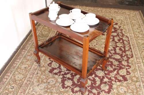 A wonderful solid Imbuia 2-tier tea/ drinks trolley with removable tray on its original castors