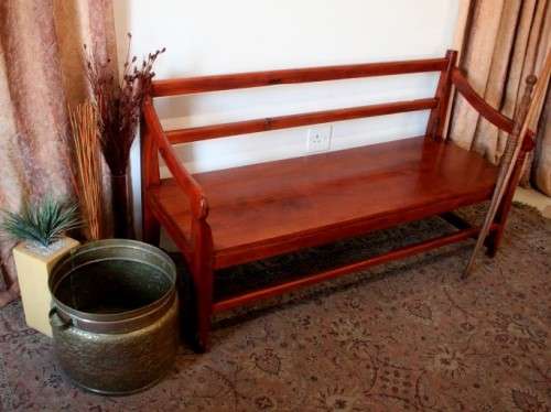A wonderful well-made, sturdy vintage three seater  wood bench - perfect  in a lapa/ patio!