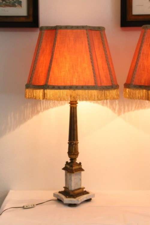 An incredible pair of antique ornate gilt-brass & white Italian marble buffet lamps w/ period shades