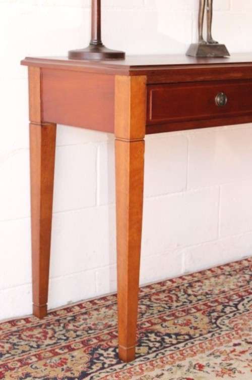 A stunning and well made quality double-drawer mahogany hallway/ console table with ring handles