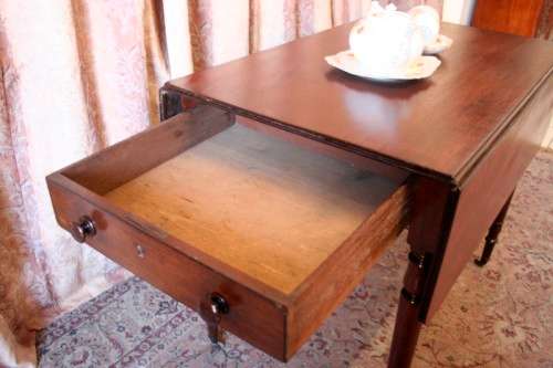vintage drop leaf occasional table with ornate brass castors and a drawer-Lifespace Sale