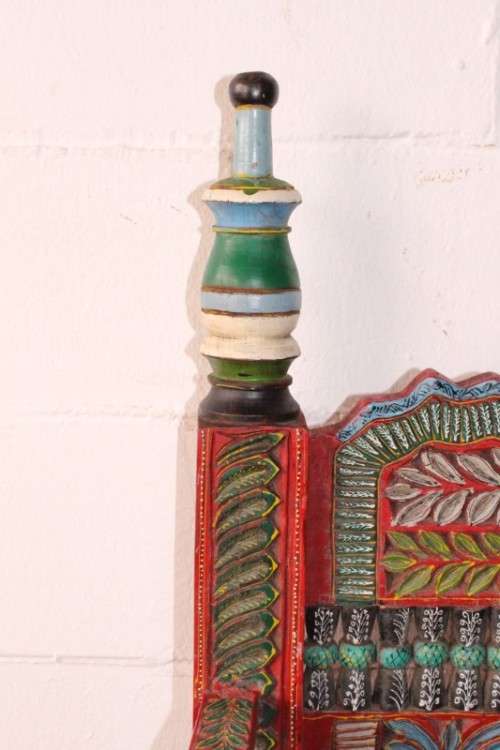 A rare antique brightly coloured wedding seat from the Swati Valley in Pakistan w/ a Persian cushion