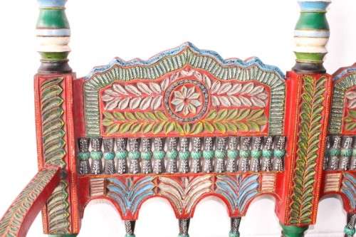 A rare antique brightly coloured wedding seat from the Swati Valley in Pakistan w/ a Persian cushion