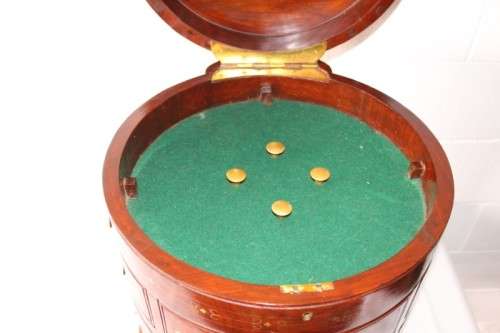 A spectacular and beautifully made solid rosewood round 12-drawer jewellery chest with brass inlay