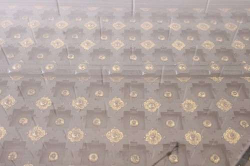 A  6-8 seater Indian teak dining table w/ brass detailing and bevelled glass top - Lifespace Sale