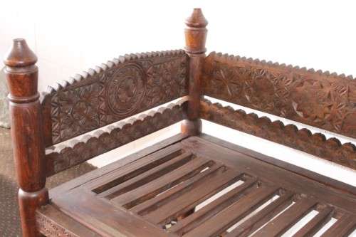 A stunningly hand carved cedar wood vintage Pakistani Charpoi day bed/ bench from the Swati Valley