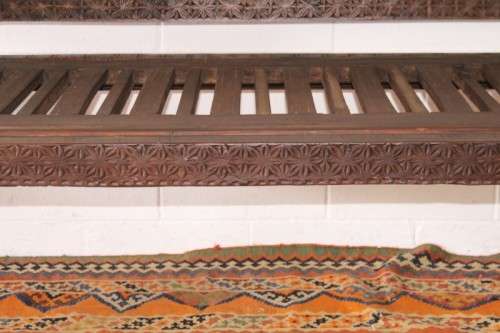 A stunningly hand carved cedar wood vintage Pakistani Charpoi day bed/ bench from the Swati Valley