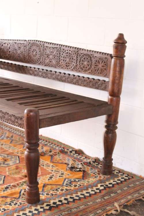 A stunningly hand carved cedar wood vintage Pakistani Charpoi day bed/ bench from the Swati Valley