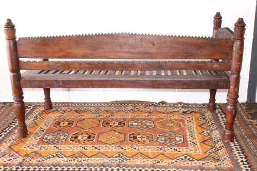 A stunningly hand carved cedar wood vintage Pakistani Charpoi day bed/ bench from the Swati Valley