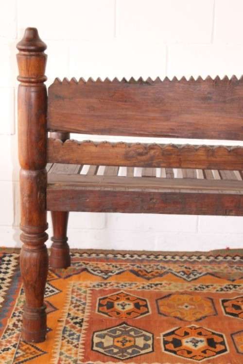 A stunningly hand carved cedar wood vintage Pakistani Charpoi day bed/ bench from the Swati Valley
