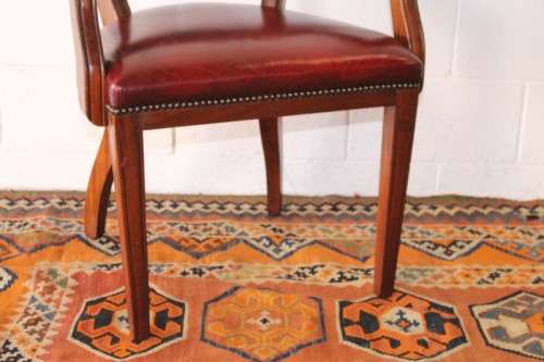 **RS17** A pair of vintage chateau-red leather visitors/ occasional armchairs w/ deep button backs