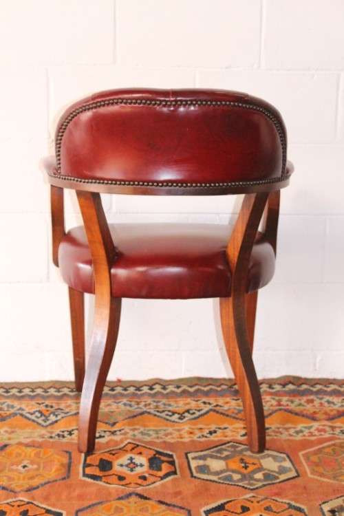 **RS17** A pair of vintage chateau-red leather visitors/ occasional armchairs w/ deep button backs