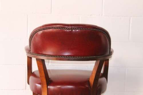 **RS17** A pair of vintage chateau-red leather visitors/ occasional armchairs w/ deep button backs