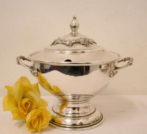 An exquisite vintage "Seranco" silver plated tureen with a slotted lid and beautiful ornate handles
