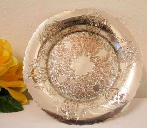 A gorgeous vintage silver plated lidded breakfast butter dish with an ornate lid and glass dish.