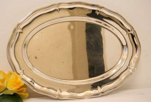A gorgeous large silver plated platter with an elegant design.
