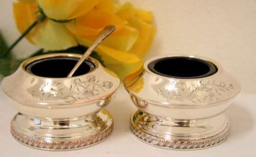 A set of gorgeous EPNS silver plated mustard pots with cobalt blue glass bowls and a spoon.