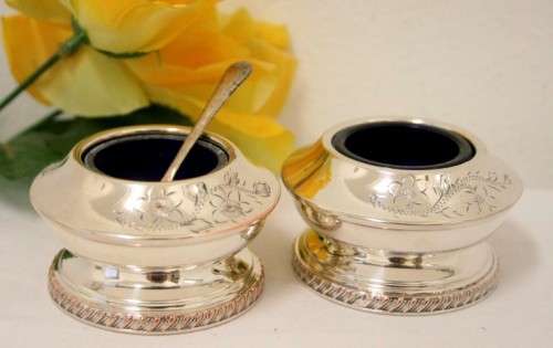 A set of gorgeous EPNS silver plated mustard pots with cobalt blue glass bowls and a spoon.