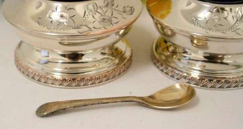 A set of gorgeous EPNS silver plated mustard pots with cobalt blue glass bowls and a spoon.