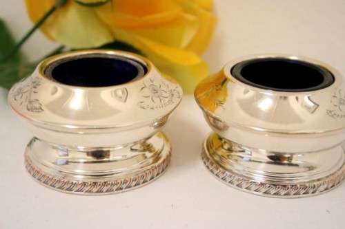 A set of gorgeous EPNS silver plated mustard pots with cobalt blue glass bowls and a spoon.