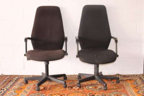 **RS17** 2x mobile high-back office/ desk chairs; one is black the other is brown - one bid for both