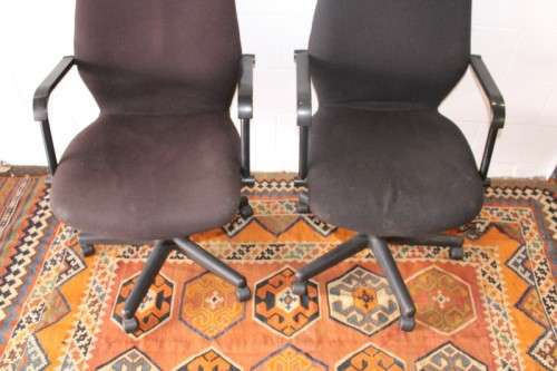 **RS17** 2x mobile high-back office/ desk chairs; one is black the other is brown - one bid for both