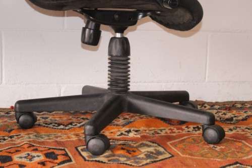 **RS17** 2x mobile high-back office/ desk chairs; one is black the other is brown - one bid for both