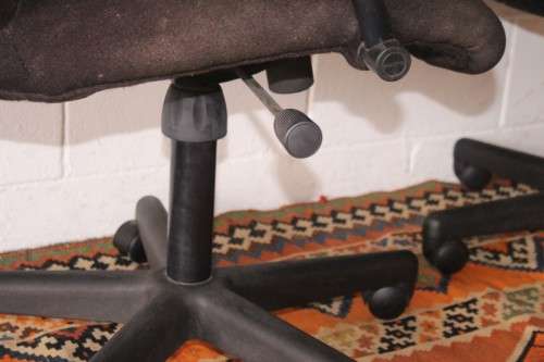 **RS17** 2x mobile high-back office/ desk chairs; one is black the other is brown - one bid for both