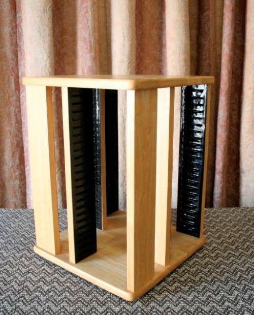 A wonderful wooden rotating table top CD stand with space for approximately 80x CD's