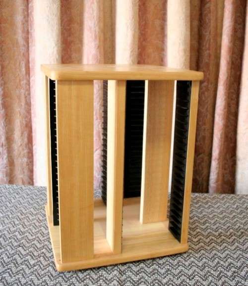 A wonderful wooden rotating table top CD stand with space for approximately 80x CD's