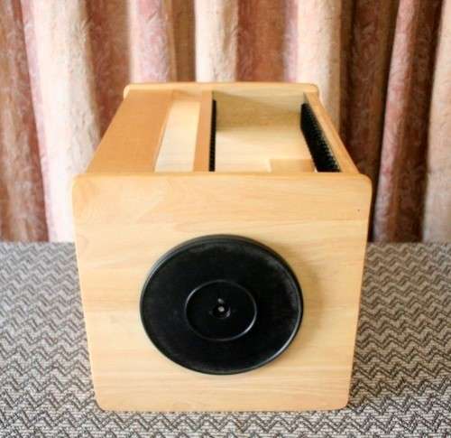 A wonderful wooden rotating table top CD stand with space for approximately 80x CD's