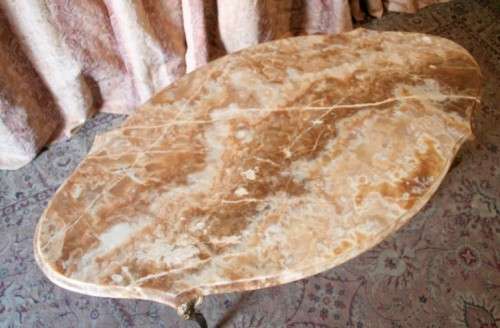 A superb solid brass and marble top oval coffee table. - stunning in formal lounges, entrances!!