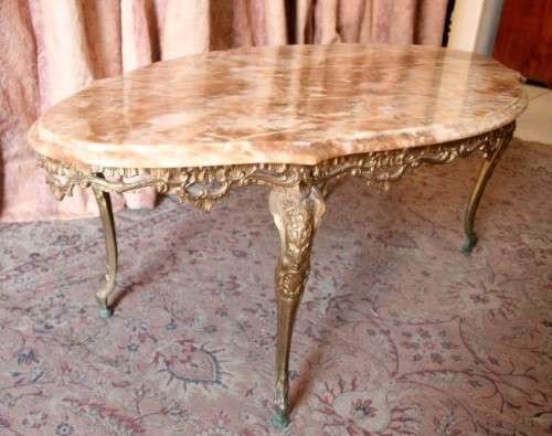 A superb solid brass and marble top oval coffee table. - stunning in formal lounges, entrances!!