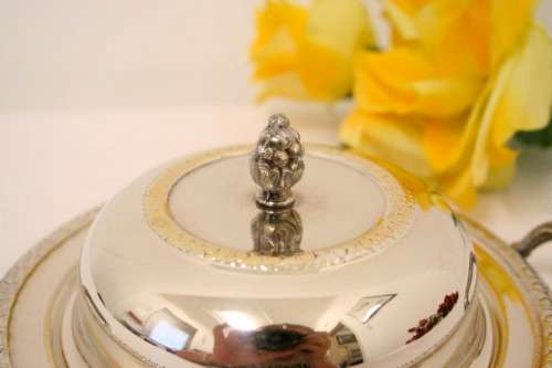 A gorgeous vintage Seranco silver plated lidded breakfast butter dish with an ornate lid.