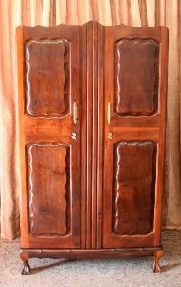 A stunning vintage solid Imbuia 2 door ball & claw wardrobe w/ hanging space and 3x drawers