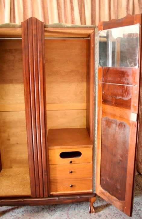 A stunning vintage solid Imbuia 2 door ball & claw wardrobe w/ hanging space and 3x drawers