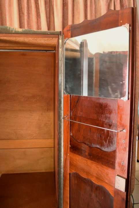 A stunning vintage solid Imbuia 2 door ball & claw wardrobe w/ hanging space and 3x drawers