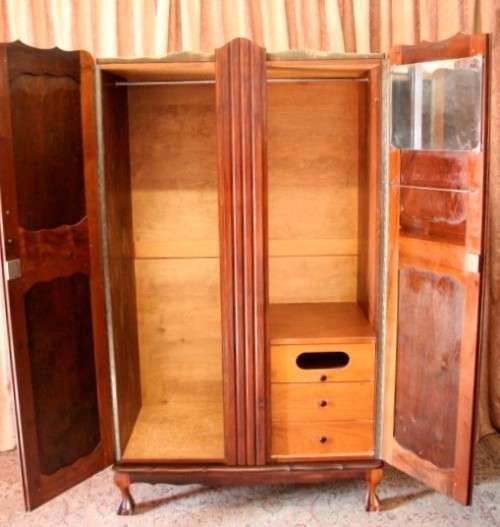 A stunning vintage solid Imbuia 2 door ball & claw wardrobe w/ hanging space and 3x drawers