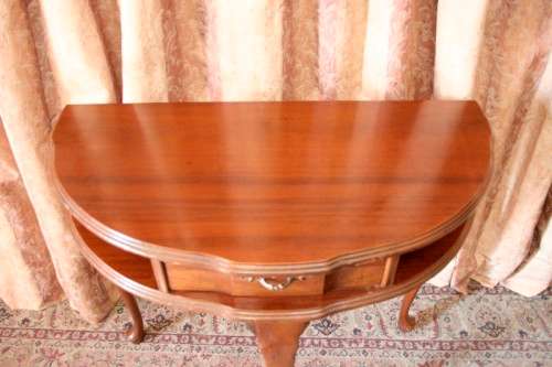 A beautiful vintage solid Imbuia scalloped edge Queen Anne half moon display/ occasional table