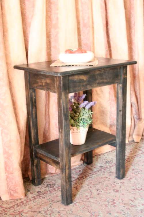 A good, well made solid wood occasional table with a rustic gold paint technique. Lifespace Sale