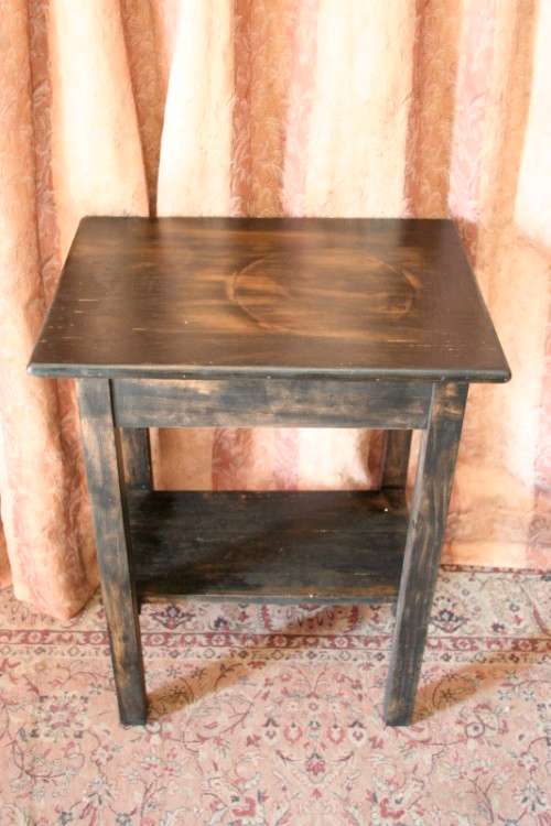 A good, well made solid wood occasional table with a rustic gold paint technique. Lifespace Sale