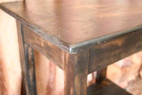 A good, well made solid wood occasional table with a rustic gold paint technique. Lifespace Sale