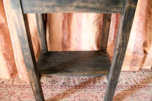 A good, well made solid wood occasional table with a rustic gold paint technique. Lifespace Sale