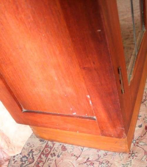 A fantastic solid Teak display cabinet w lead glass doors & large cupboards.