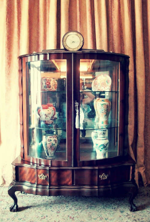 An exquisite ball & claw 2 glass door show cabinet w/ 2 bottom drawers, light and brass handles!!