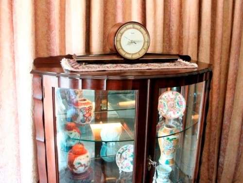 An exquisite ball & claw 2 glass door show cabinet w/ 2 bottom drawers, light and brass handles!!