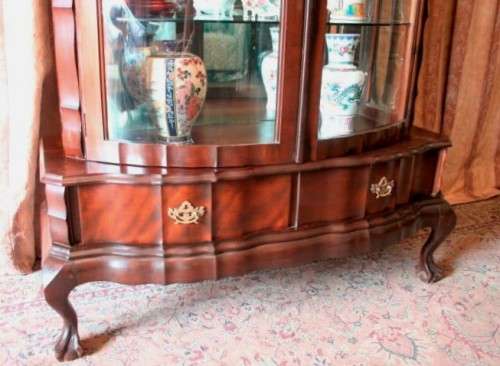 An exquisite ball & claw 2 glass door show cabinet w/ 2 bottom drawers, light and brass handles!!