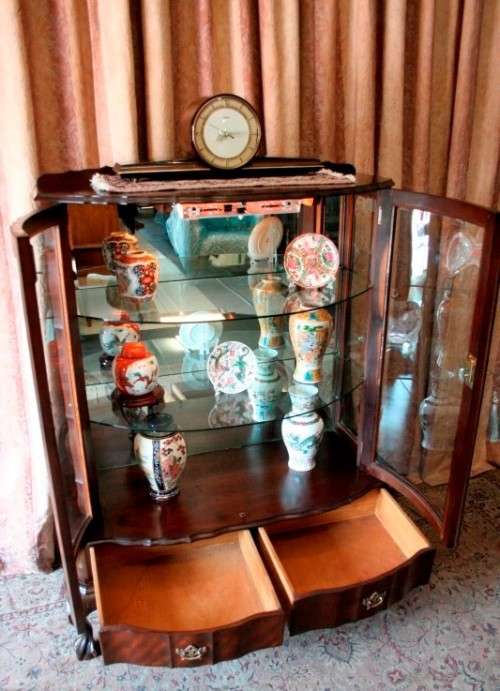 An exquisite ball & claw 2 glass door show cabinet w/ 2 bottom drawers, light and brass handles!!