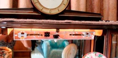 An exquisite ball & claw 2 glass door show cabinet w/ 2 bottom drawers, light and brass handles!!