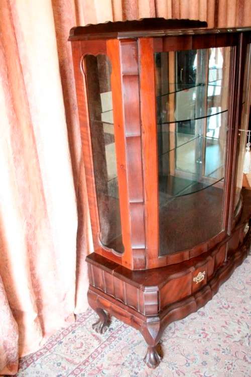 An exquisite ball & claw 2 glass door show cabinet w/ 2 bottom drawers, light and brass handles!!